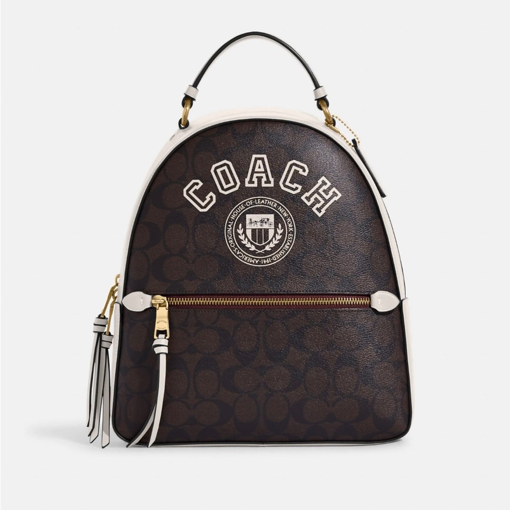 Coach Jordyn Backpack In Signature Canvas With Varsity Motif. Free wristlet.